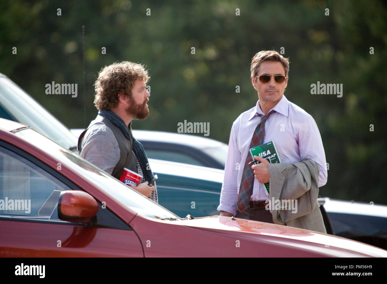 (Lr) ZACH GALIFIANAKIS as Ethan Tremblay and ROBERT DOWNEY JR. as