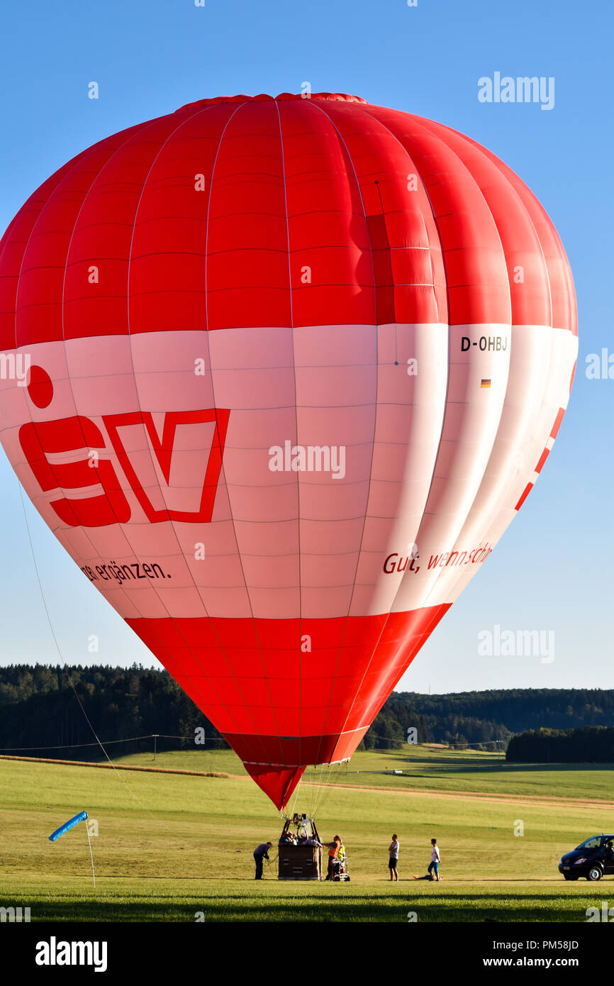 A hot air balloon is a lighter-than-air aircraft consisting of a bag, called an envelope, which contains heated air. Stock Photo