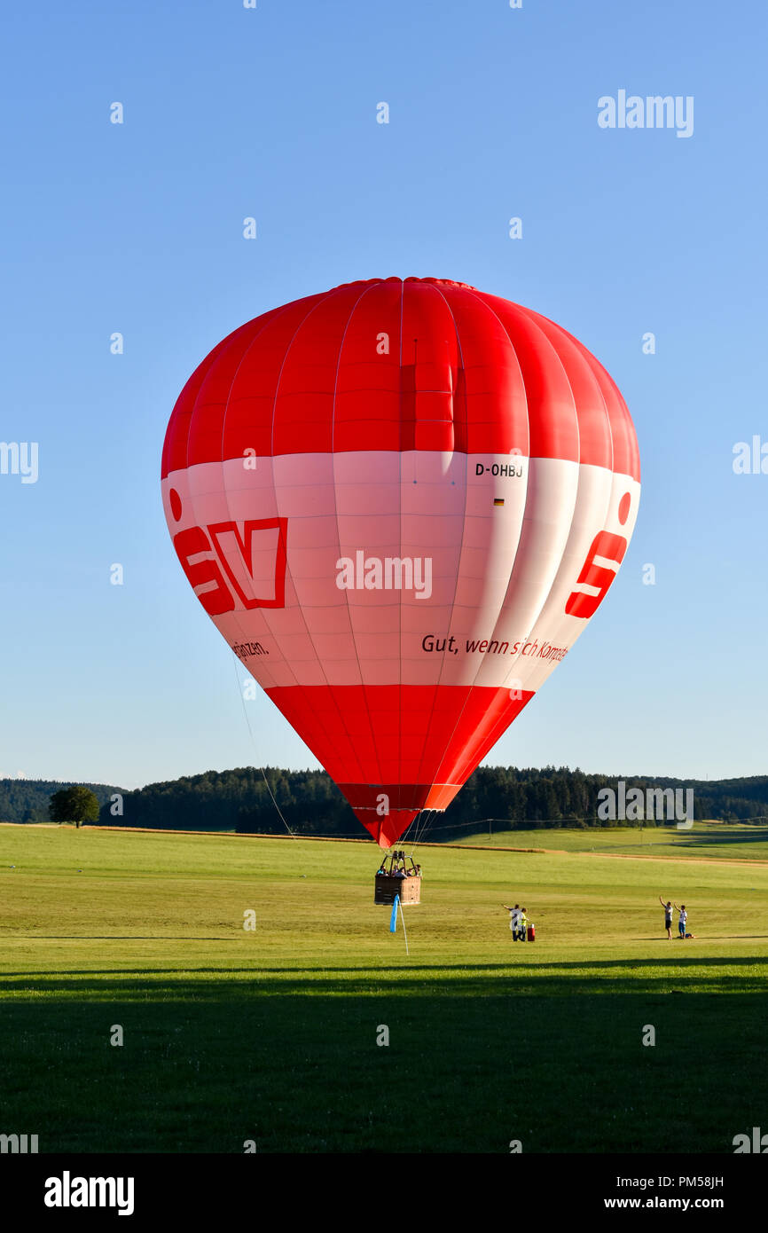 A hot air balloon is a lighter-than-air aircraft consisting of a bag, called an envelope, which contains heated air. Stock Photo