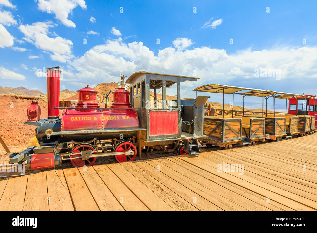 Calico, California, USA - August 15, 2018: Calico Station and Odessa Railroad narrow gauge that with an old steam train does a tour through old mines of Calico Ghost Town, San Bernardino County. Stock Photo