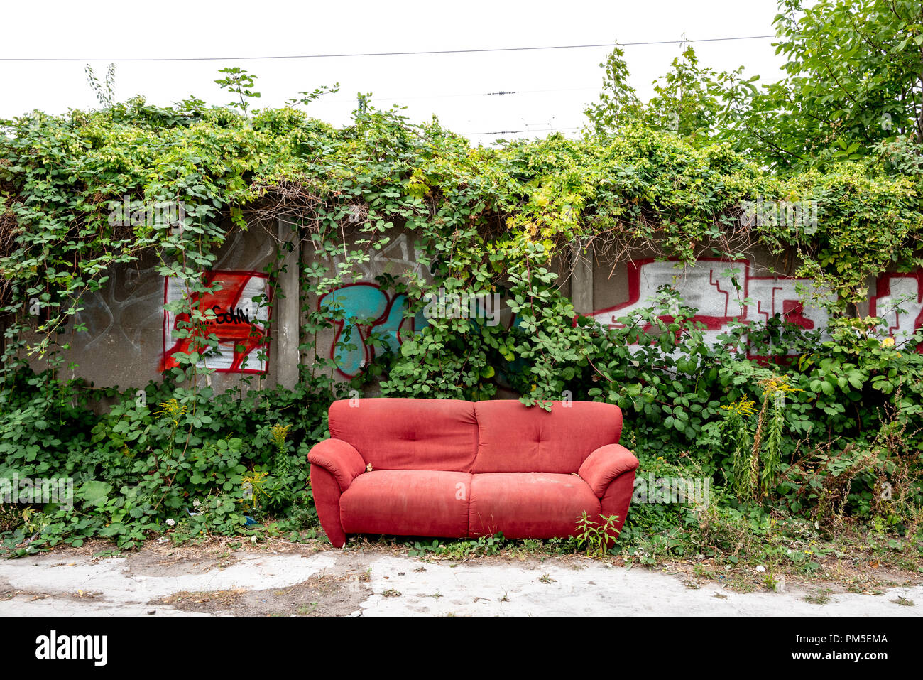 An abandoned sofa in Berlin Stock Photo Alamy