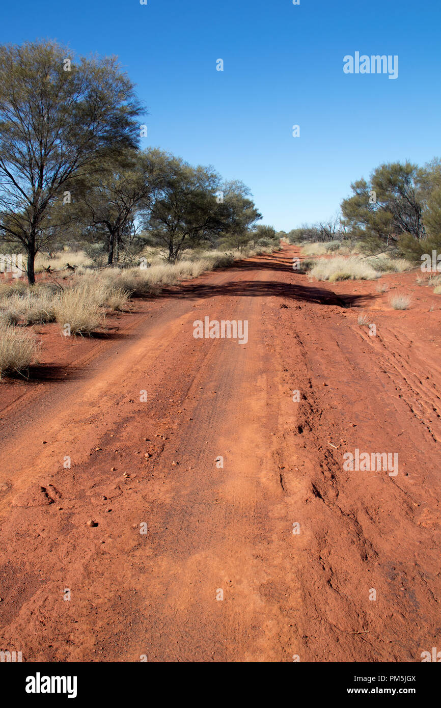 Remote, abandoned dirt road of the Gunbarrel Highway, Gibson Desert, Western Australia. Stock Photo