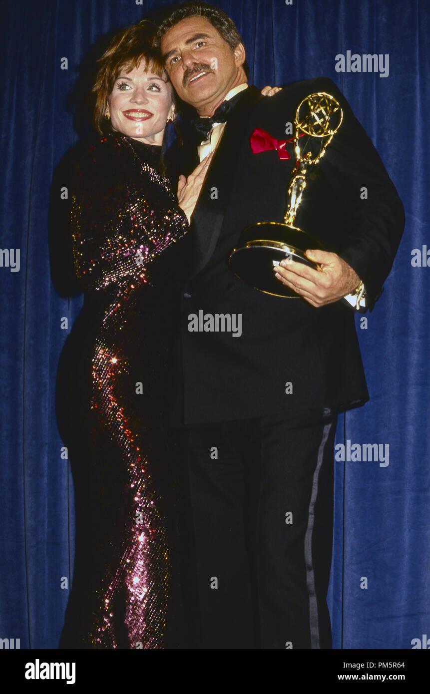 Burt Reynolds (Winner Best Television Actor) and Marilu Henner at the 49th Annual Golden Globe Awards, 1992. File Reference # 30928 997THA Stock Photo