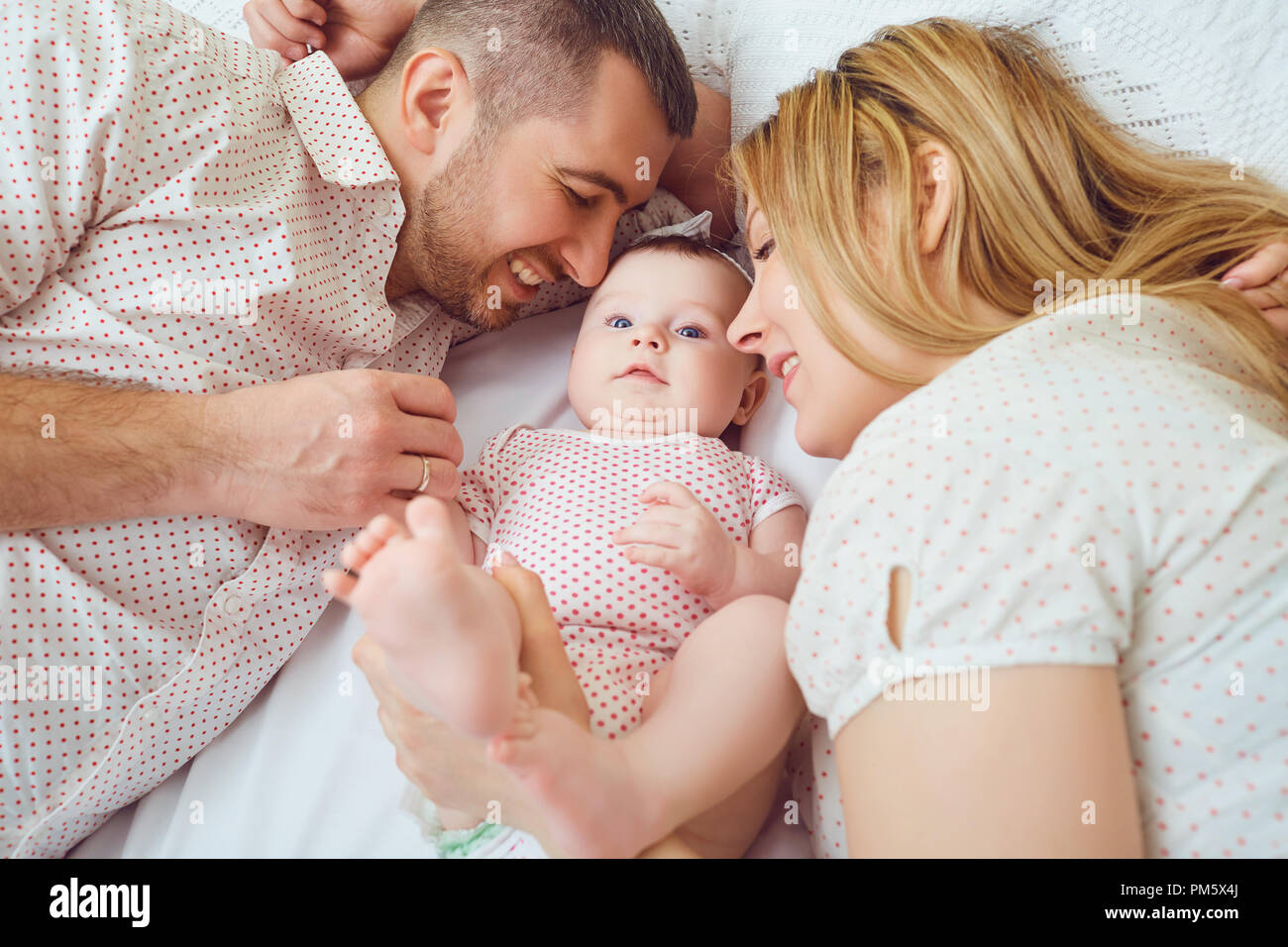 Father And Mother With Baby