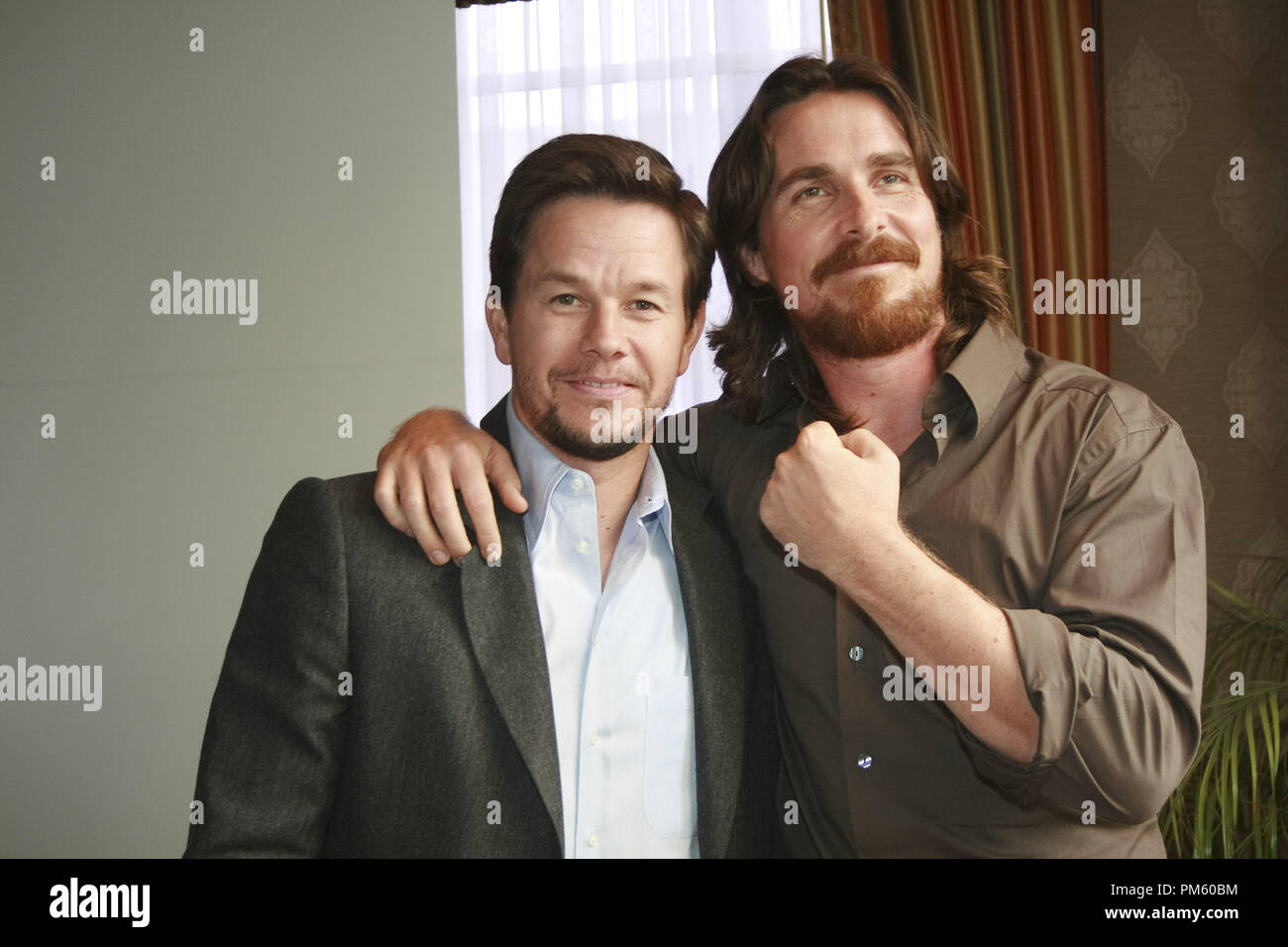 Mark Wahlberg and Christian Bale "The Fighter" Portrait Session, November 20, 2010.  Reproduction by American tabloids is absolutely forbidden. File Reference # 30787_079JRC  For Editorial Use Only -  All Rights Reserved Stock Photo