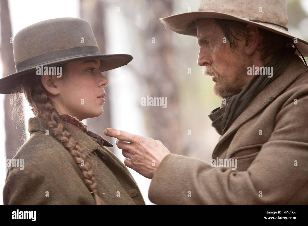 Left to right: Hailee Steinfeld plays Mattie Ross and Barry Pepper plays Lucky Ned Pepper in Paramount Pictures’ “True Grit.” Stock Photo