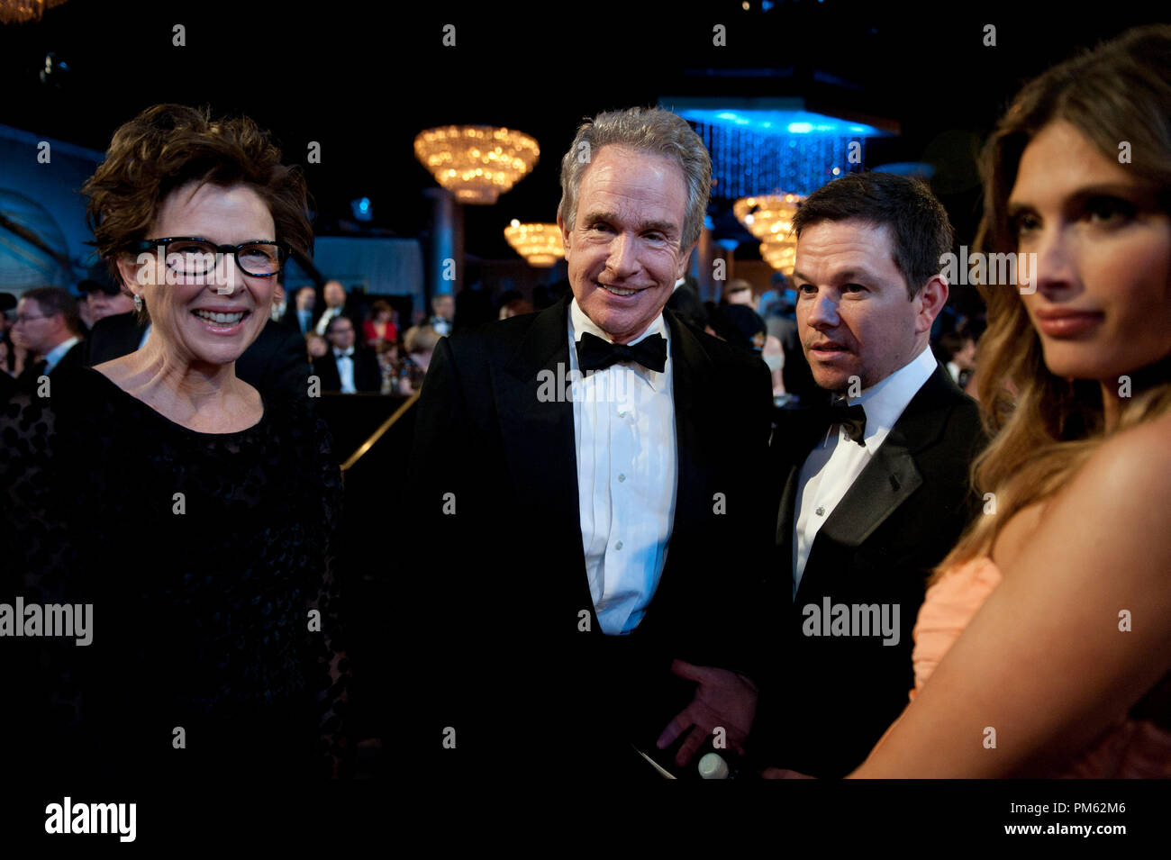Annette Bening (left), Warren Beatty  (center) and Mark Wahlbergat the 68th Annual Golden Globe Awards at the Beverly Hilton in Beverly Hills, CA on Sunday, January 16, 2011. Stock Photo
