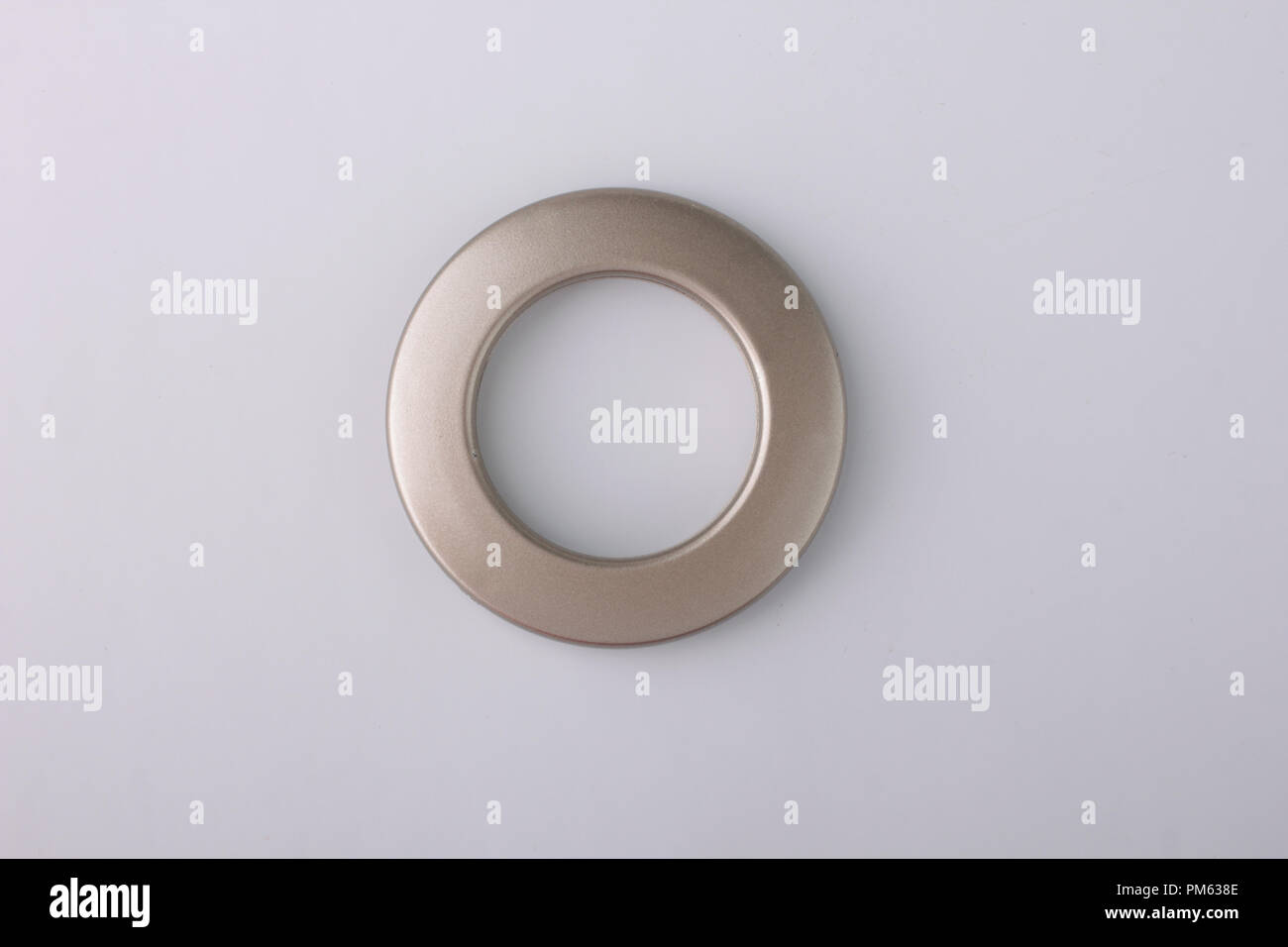 Plastic rings for fastening the fabric to the cornice for curtains