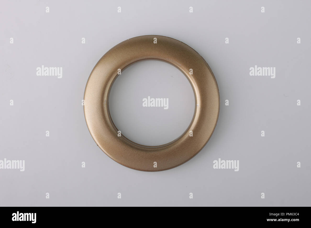 Plastic rings for fastening the fabric to the cornice for curtains