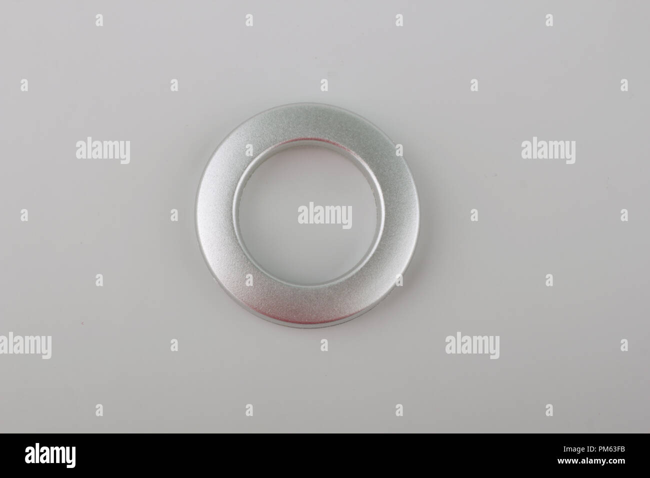 Plastic rings for fastening the fabric to the cornice for curtains