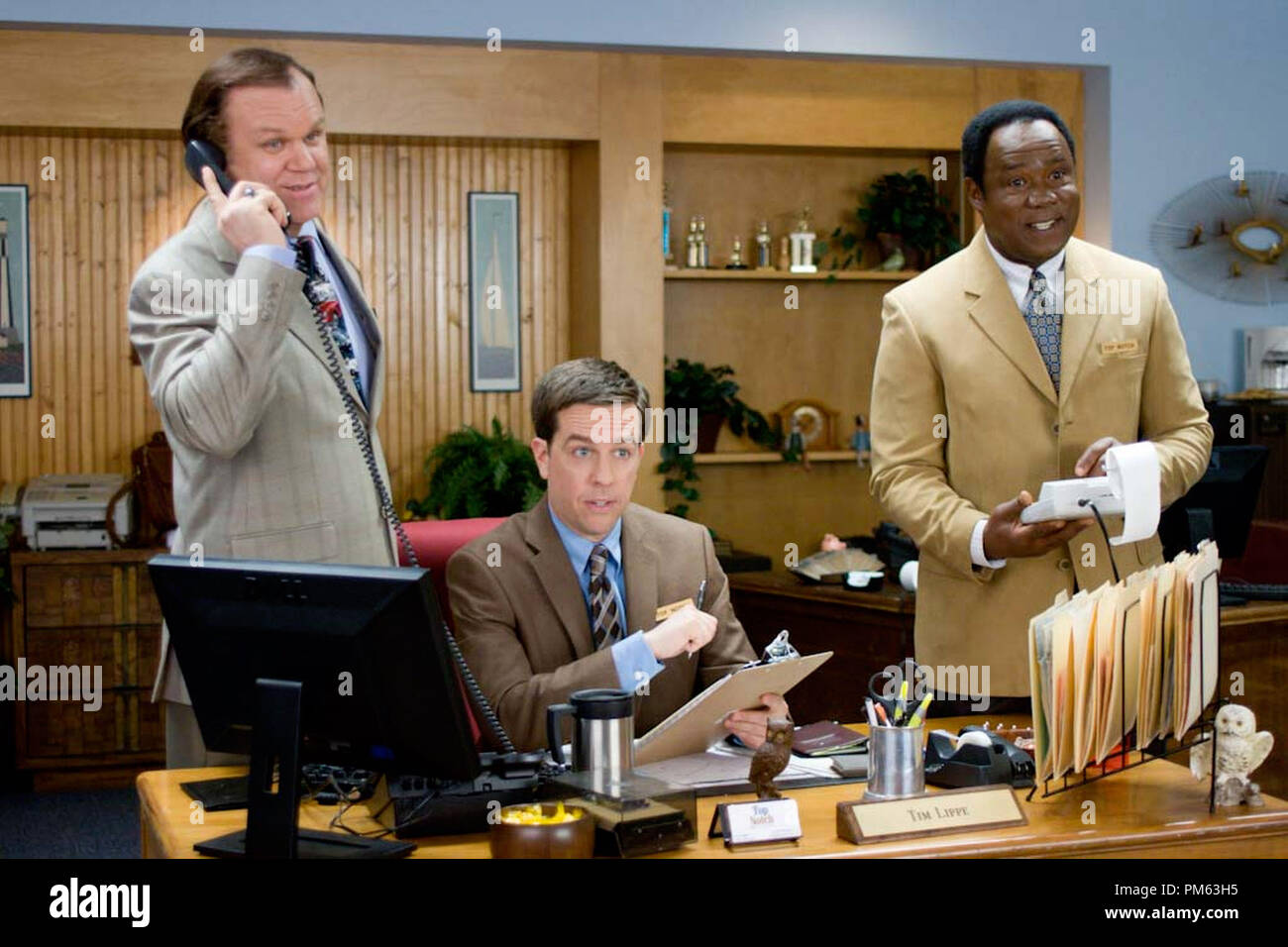 From left: John C. Reilly, Ed Helms, and Isiah Whitlock Jr. in CEDAR RAPIDS Stock Photo