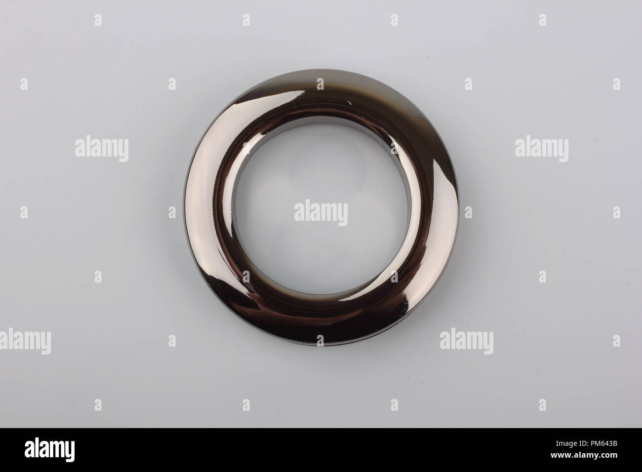 Plastic rings for fastening the fabric to the cornice for curtains