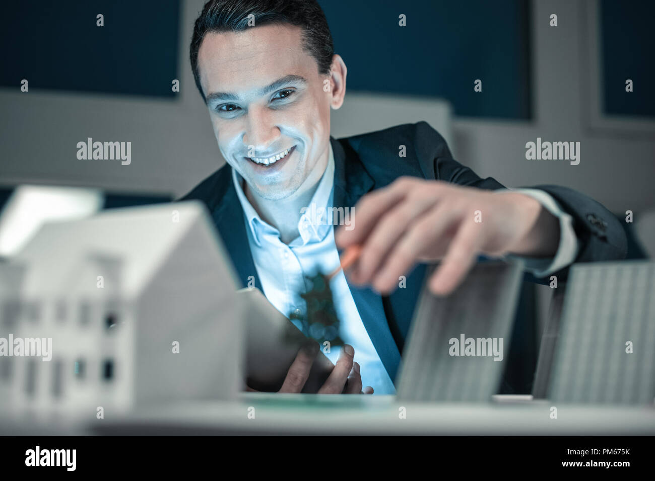 Successful engineer finishing project hi-res stock photography and ...