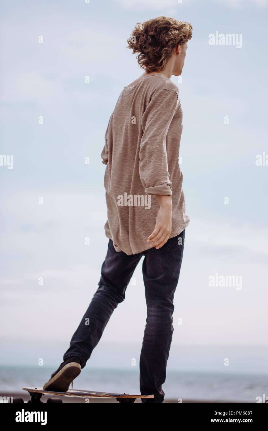 Foot Riding Away Boy posing skate board hi-res stock photography and images - Alamy