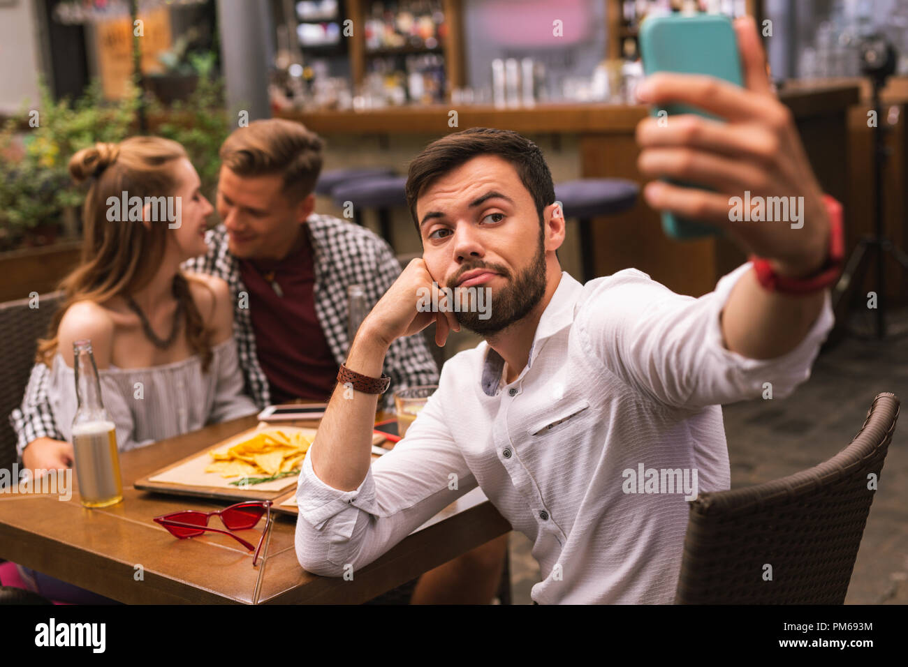 Image result for awkward male eating at a table