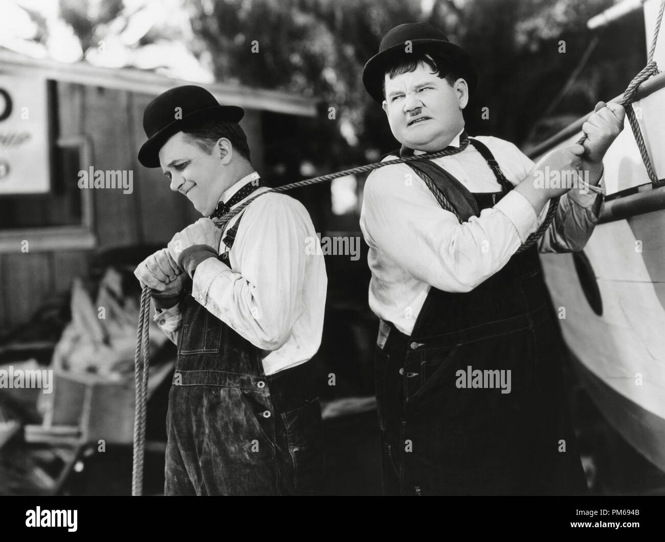 Stan Laurel and Oliver Hardy, 'Towed in a Hole' 1932 File Reference # 31316 142THA Stock Photo