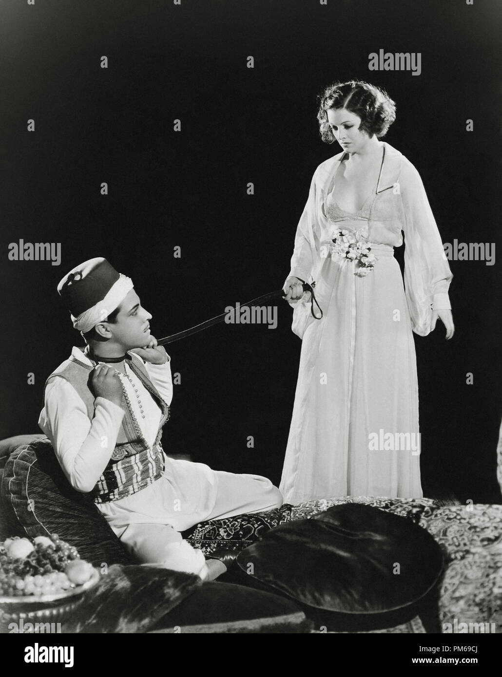 Myrna Loy and Ramon Novarro, "The Barbarian" 1933 MGM File Reference # 31316_258THA Stock Photo