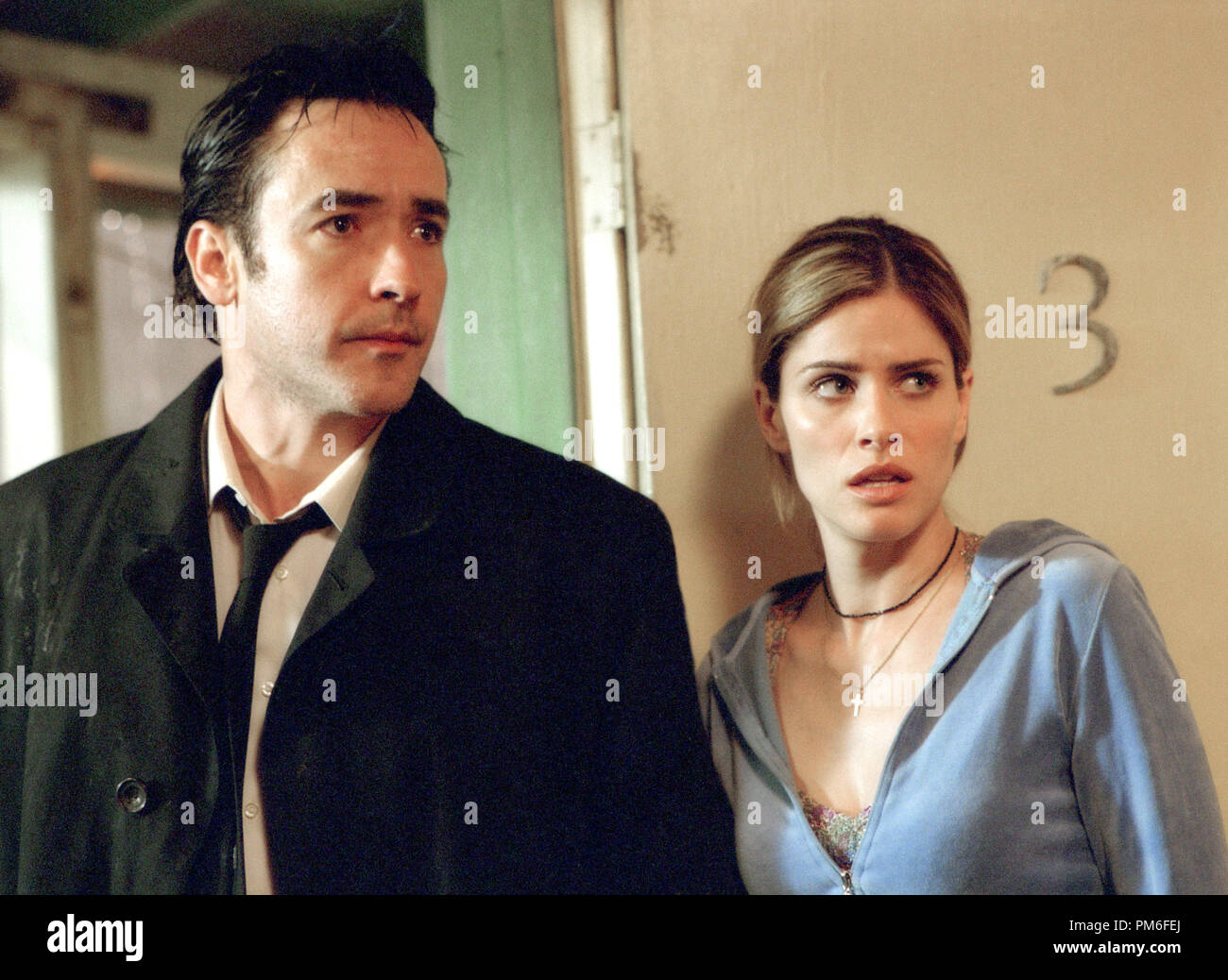 Film Still / Publicity Still from "Identity" John Cusack, Amanda Peet