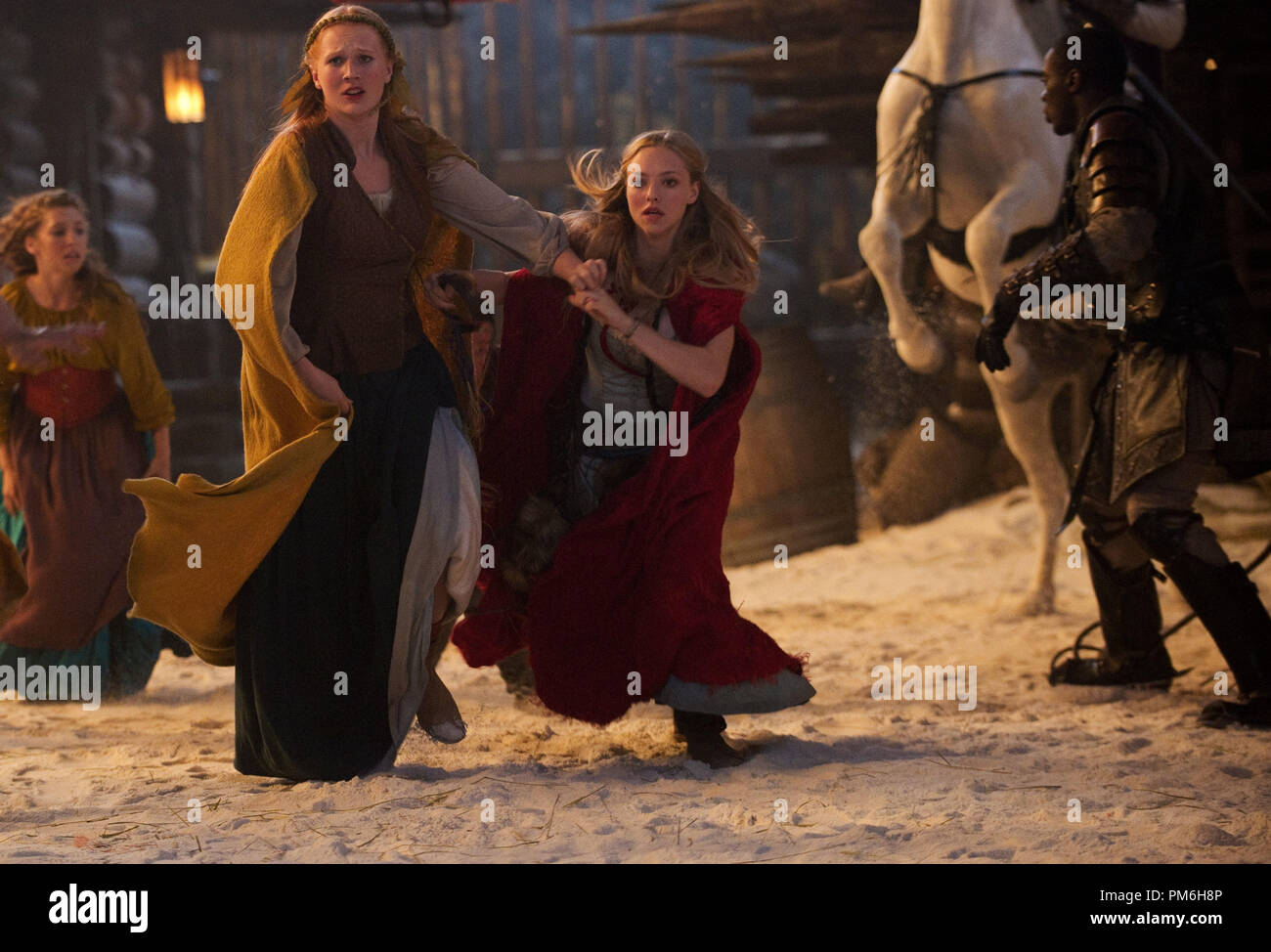 (L-r) SHAUNA KAIN as Roxanne and AMANDA SEYFRIED as Valerie in Warner Bros. Pictures' fantasy thriller 'RED RIDING HOOD,' a Warner Bros. Pictures release. Stock Photo