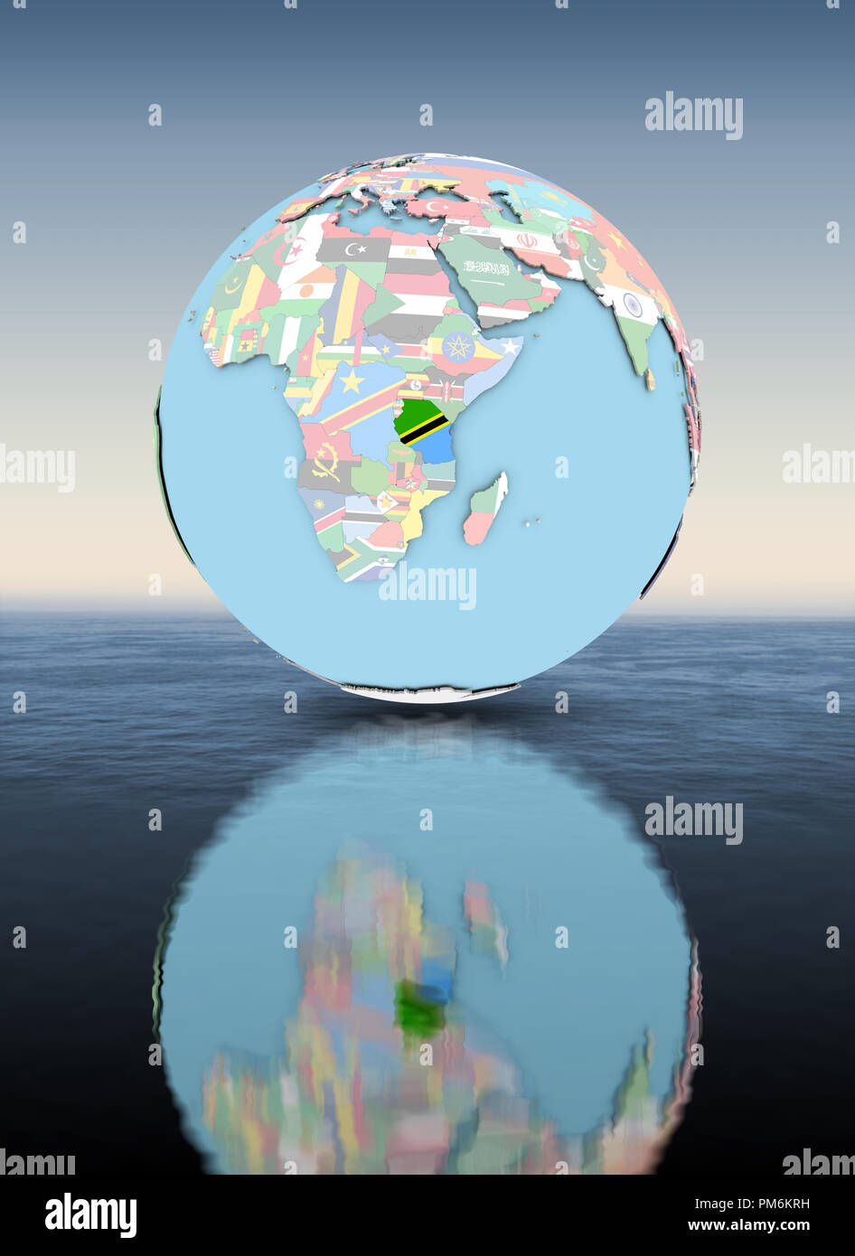 Tanzania on political globe with national flags floating above water ...