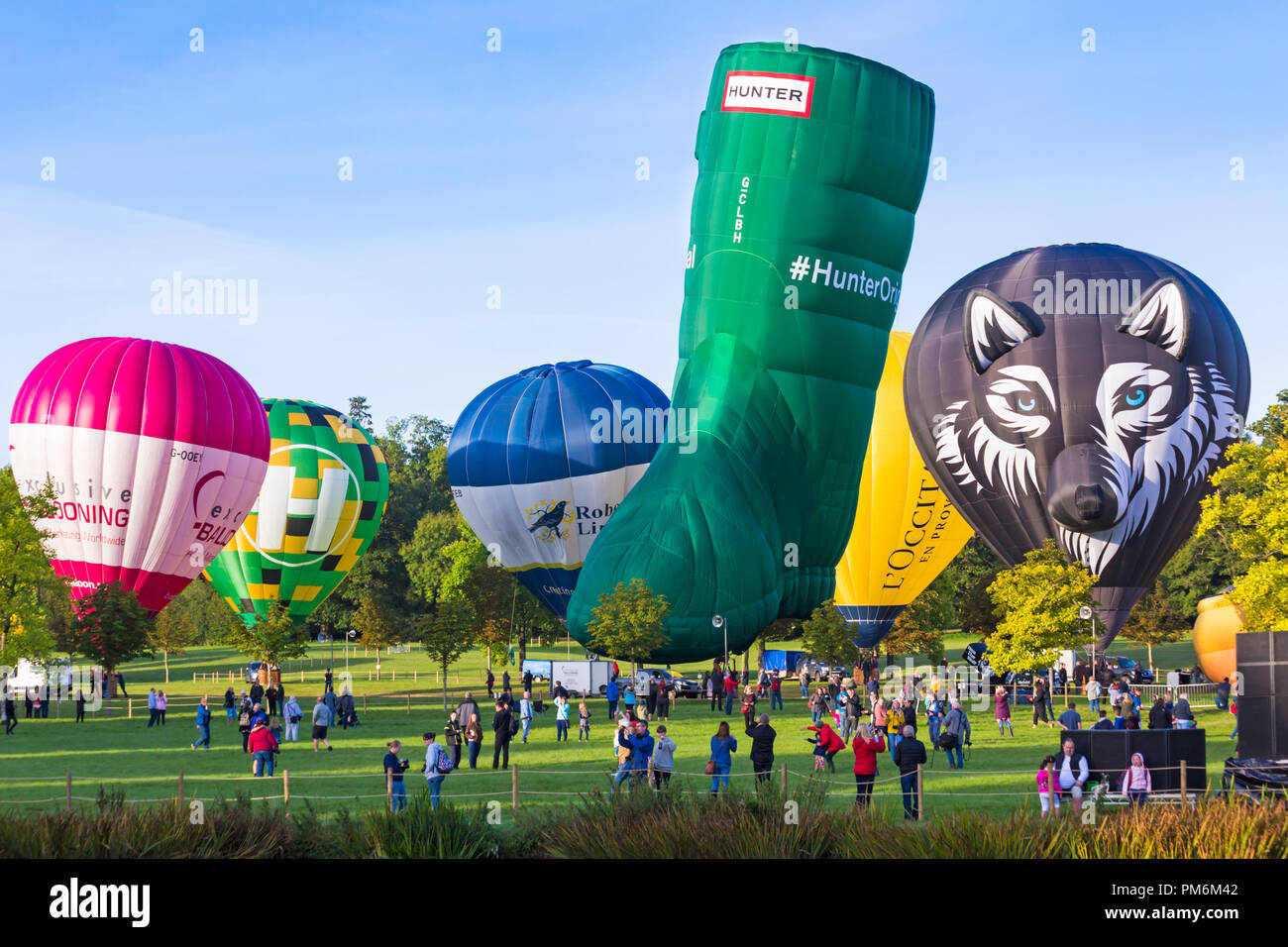 hot air balloons preparing for the morning mass ascent at Longleat Sky Safari, Wiltshire, UK in September Stock Photo