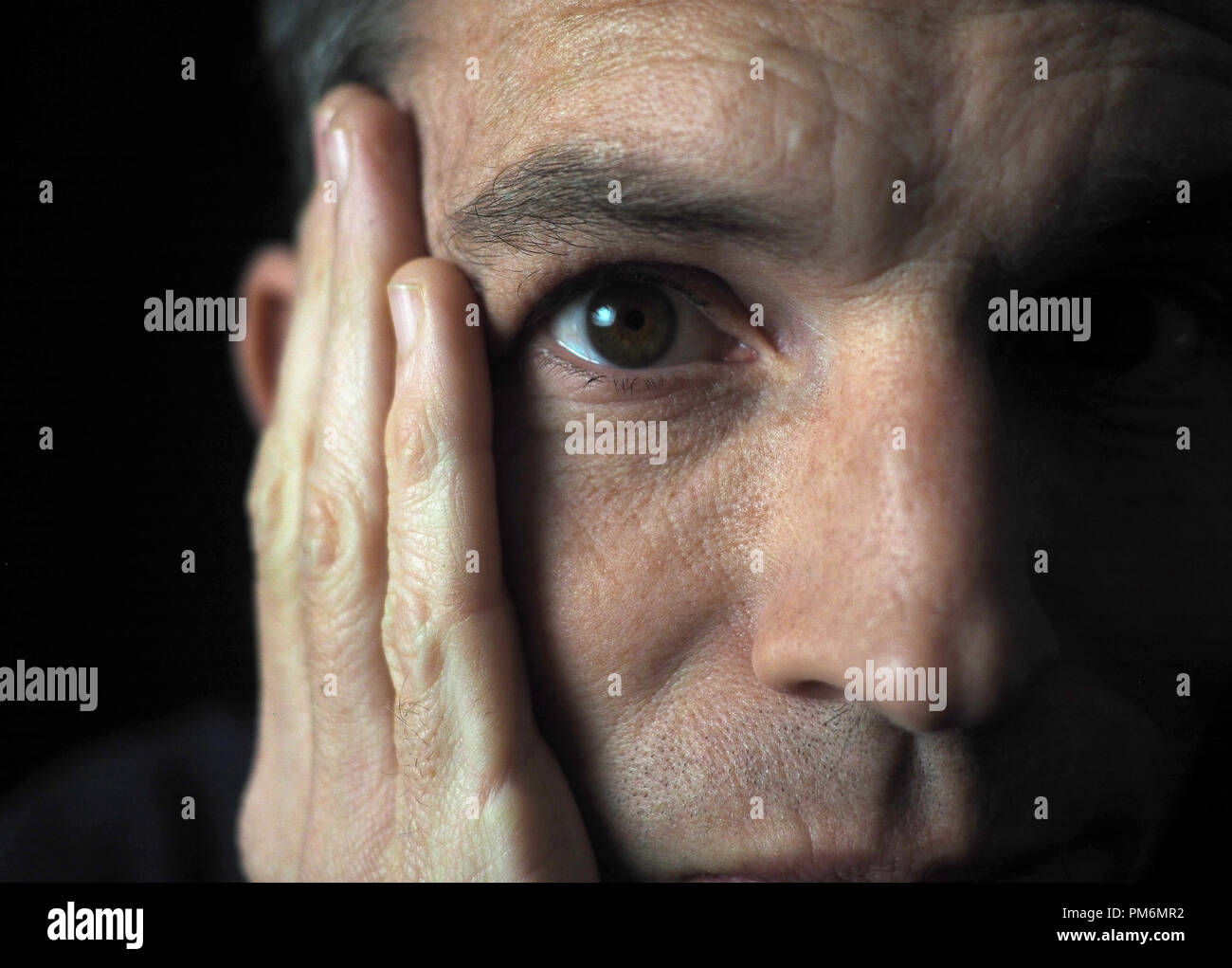 Portrait of man on black background Stock Photo - Alamy