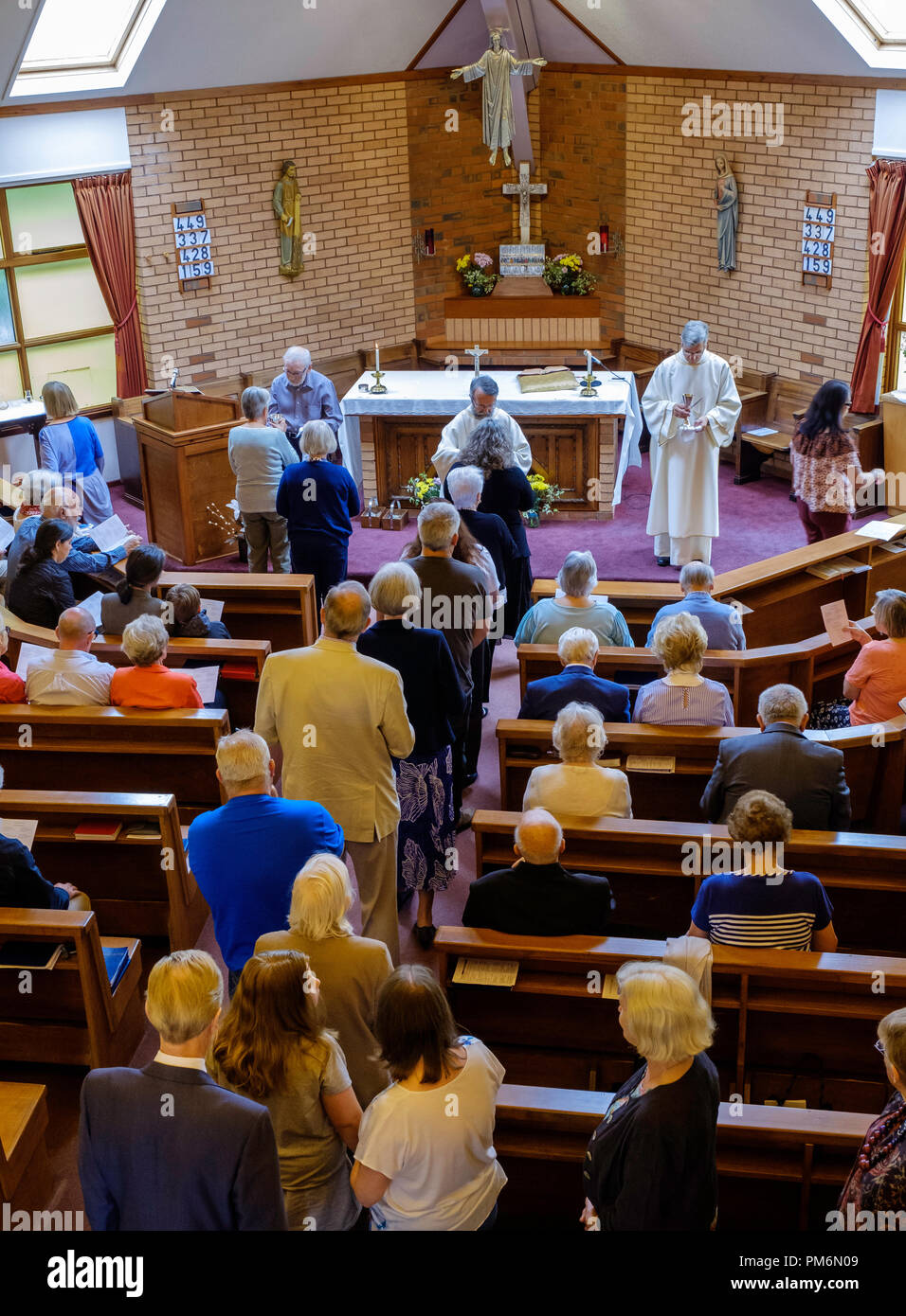 Interior of Catholic Church on occasion of last Mass before church closes.Sedbury, Gloucestershire England UK Stock Photo
