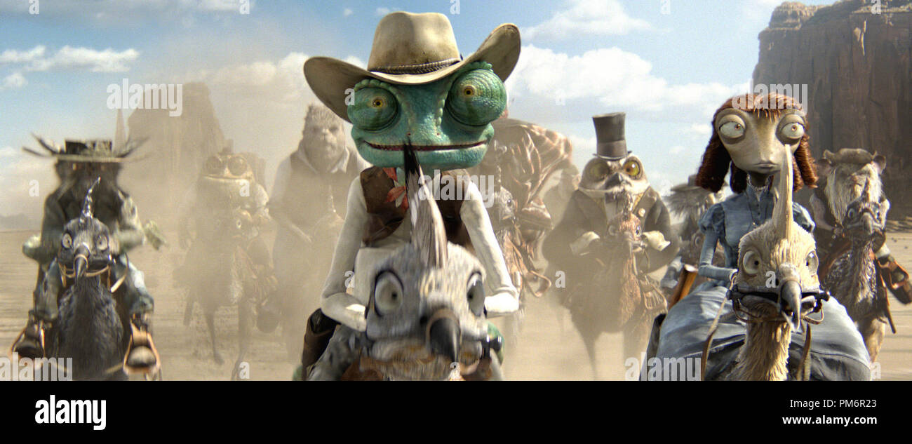 Center to right, foreground Rango (Johnny Depp) and Beans (Isla Fisher) in RANGO, from