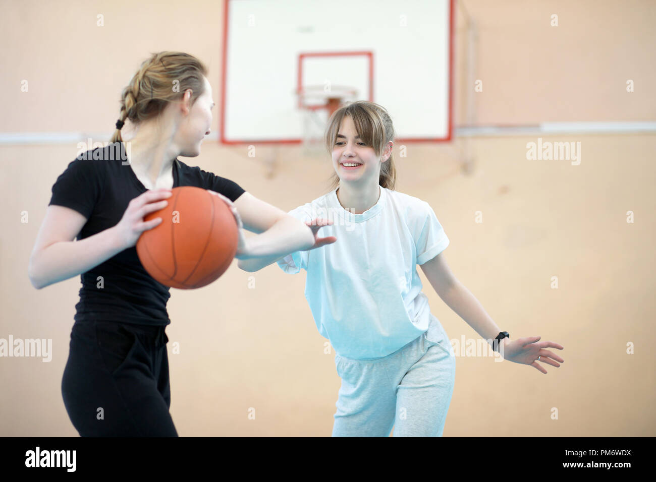 Girl In The Gym Playing A Basketball Stock Photo Alamy See inside the play gym by lovevery. https www alamy com girl in the gym playing a basketball image218969238 html