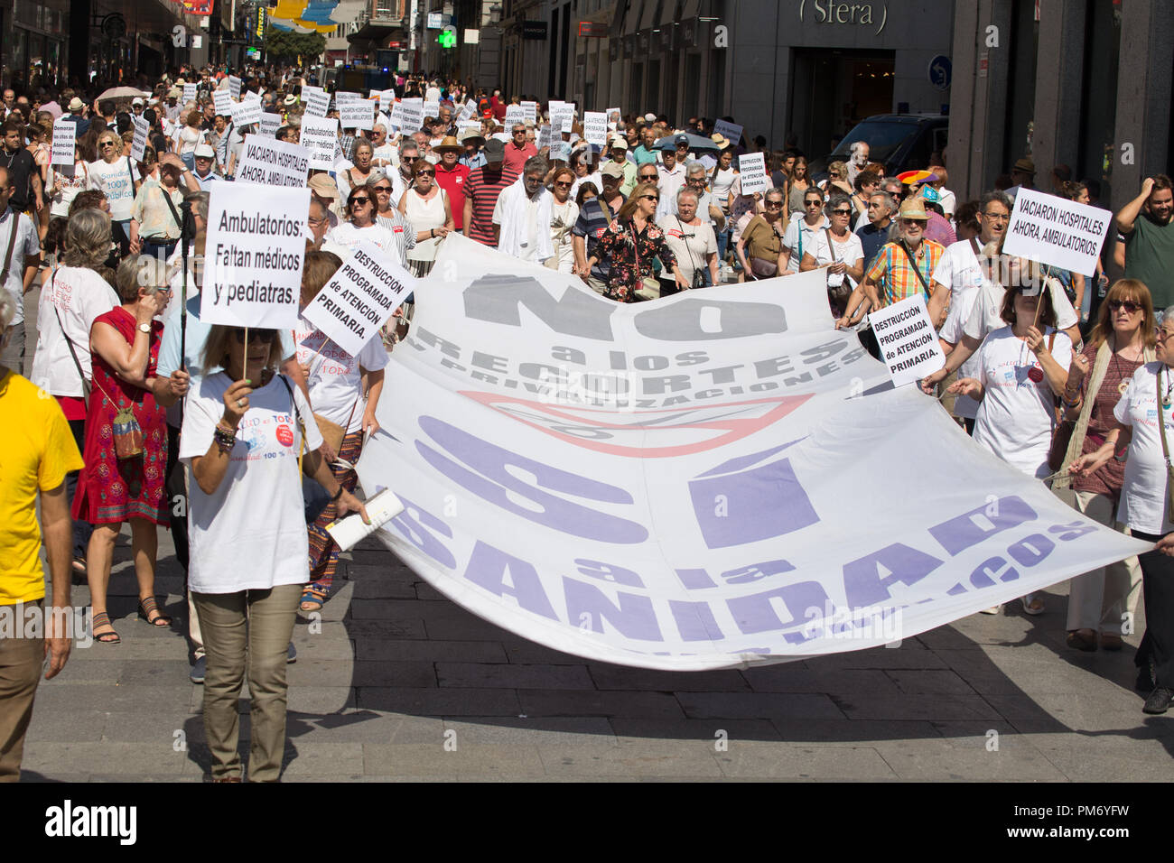 People Seen Holding A Vertical Banner That Says No To Cuts In
