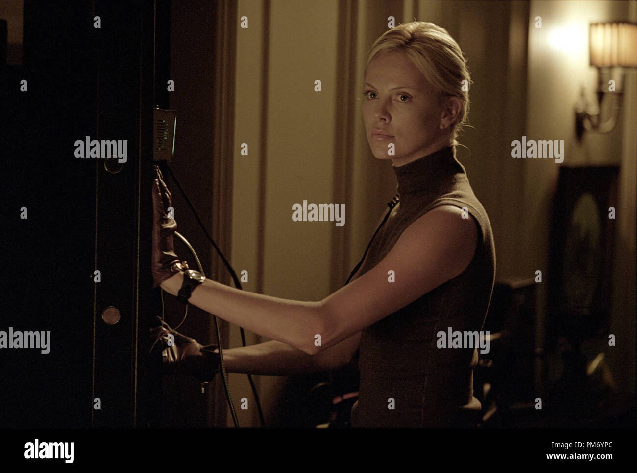 Studio Publicity Still from 'The Italian Job' Charlize Theron © 2003 Paramount Photo by Claudette Barius File Reference # 307531071THA  For Editorial Use Only -  All Rights Reserved Stock Photo