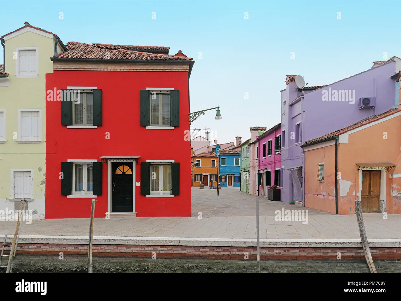 Street with colorful facade retro houses on Burano island Stock Photo ...