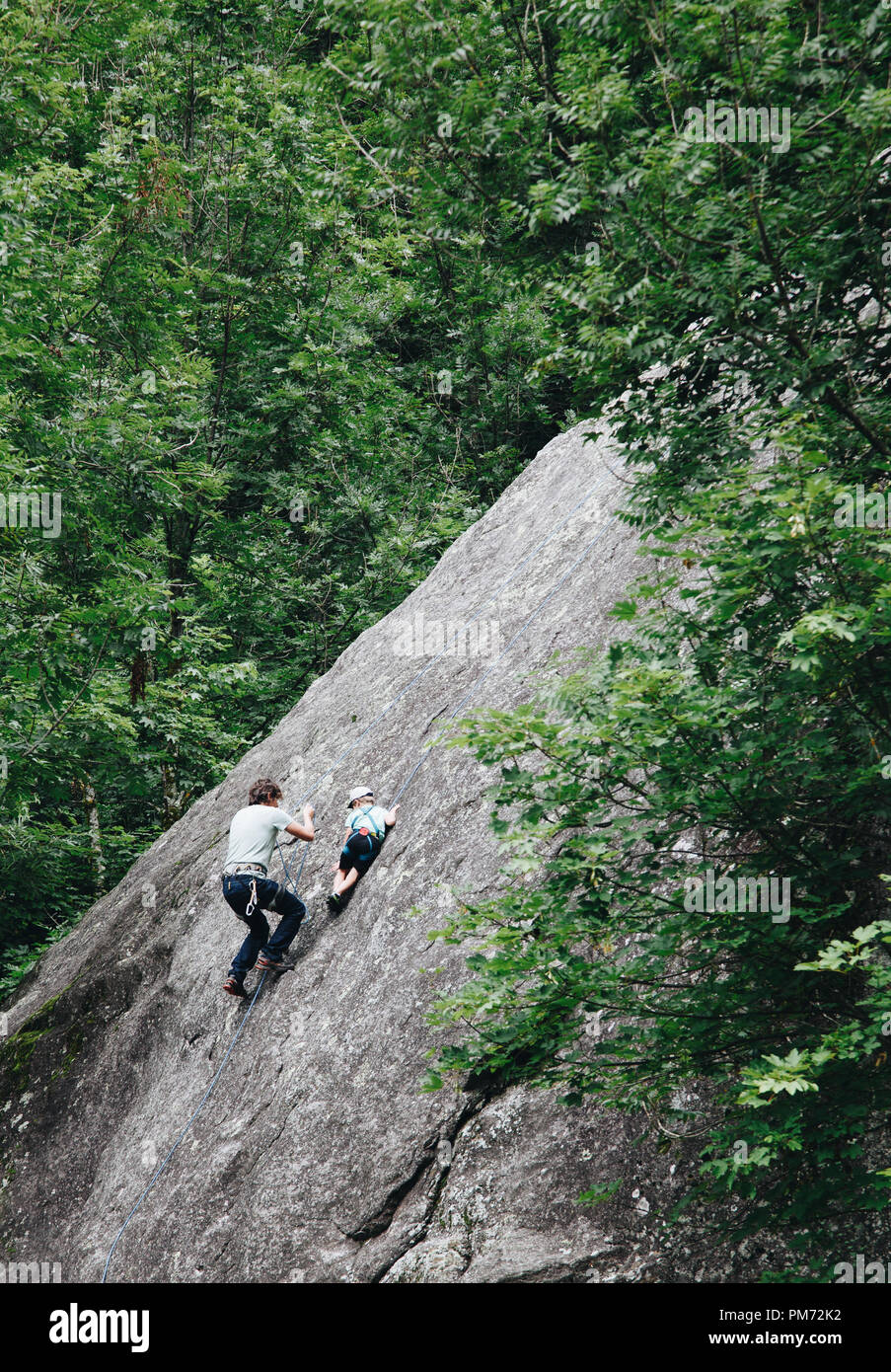 father training his song to climbing Rock Climbing Baby Making Dad Proud Stock Photo Alamy
