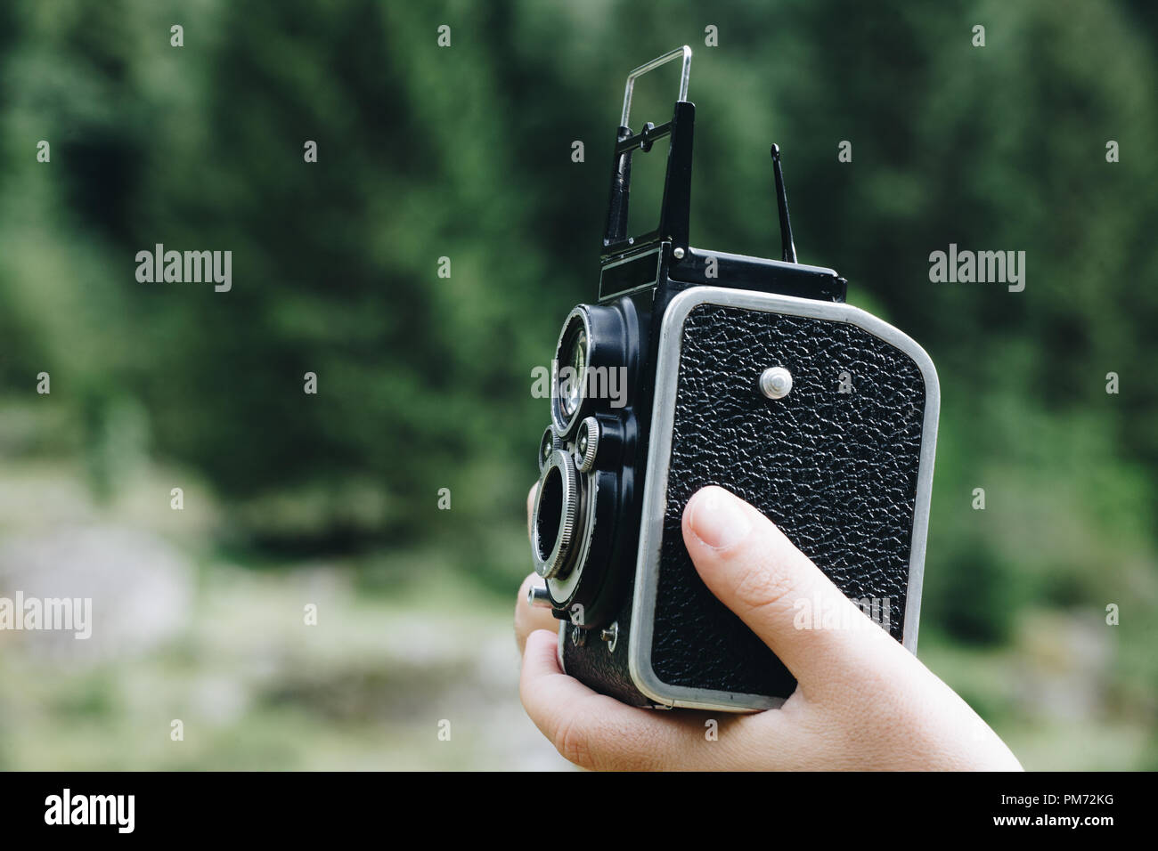 vintage photographing with old Medium format camera Stock Photo Alamy