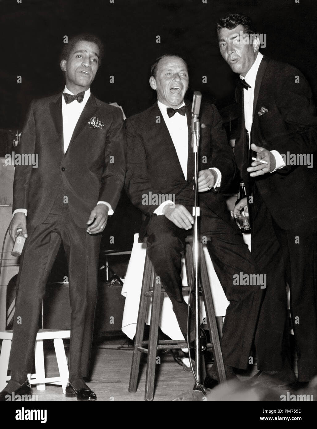 Members of the Rat Pack, Sammy Davis Jr., Frank Sinatra and Dean Martin performing, circa 1961. File Reference # 30928 352THA Stock Photo