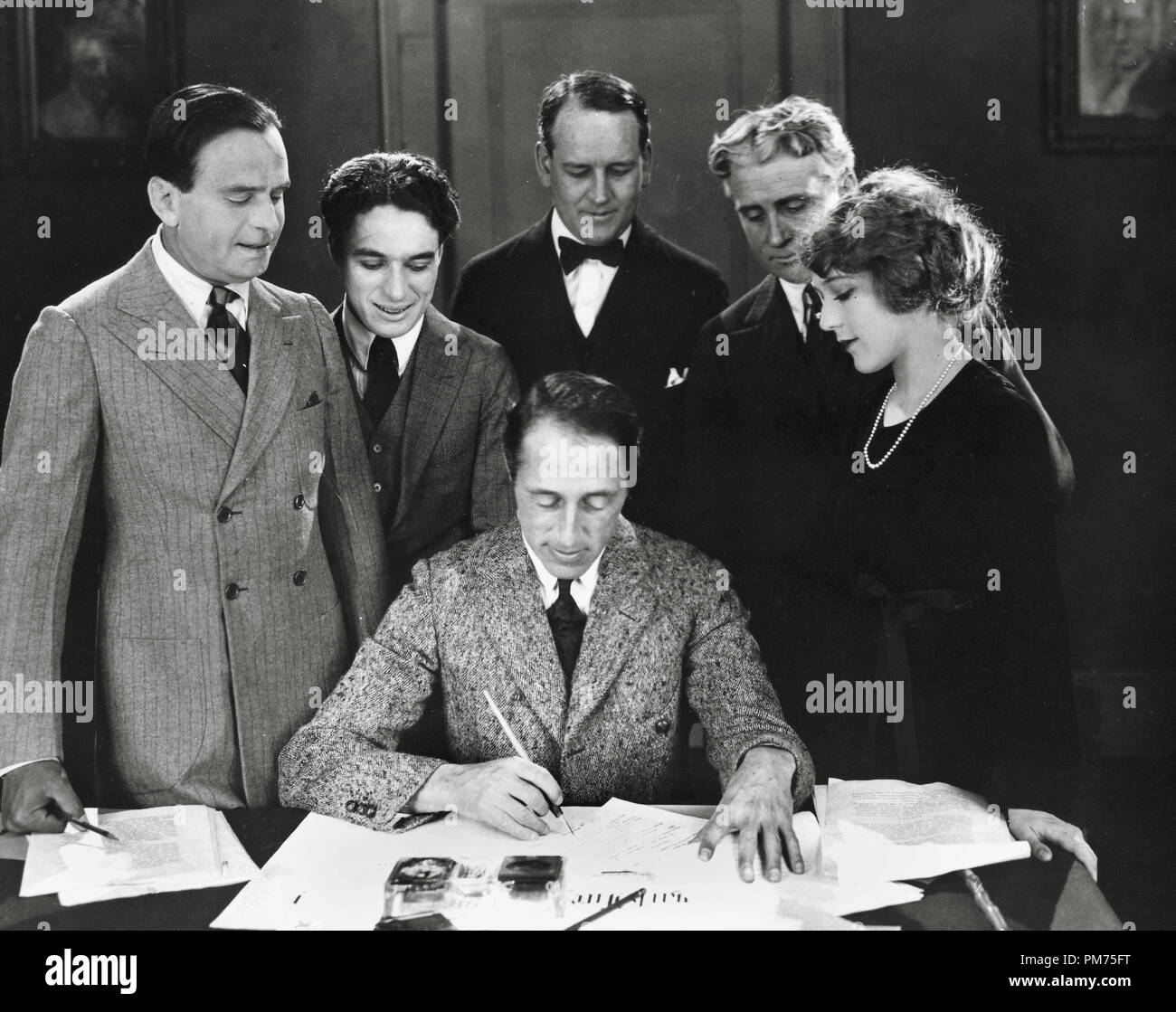 Mary Pickford, D.W. Griffith, Charles Chaplin and Douglas Fairbanks  on the day they formed United Artists Corporation, 1919.  File Reference # 30928 559THA Stock Photo