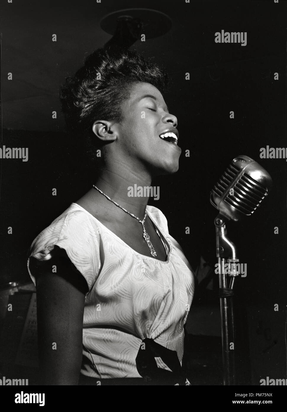 Portrait of Sarah Vaughan, Café Society, New York, N.Y., circa Aug. 1946 File Reference # 30928 687THA Photo by: William P. Gottlieb Stock Photo