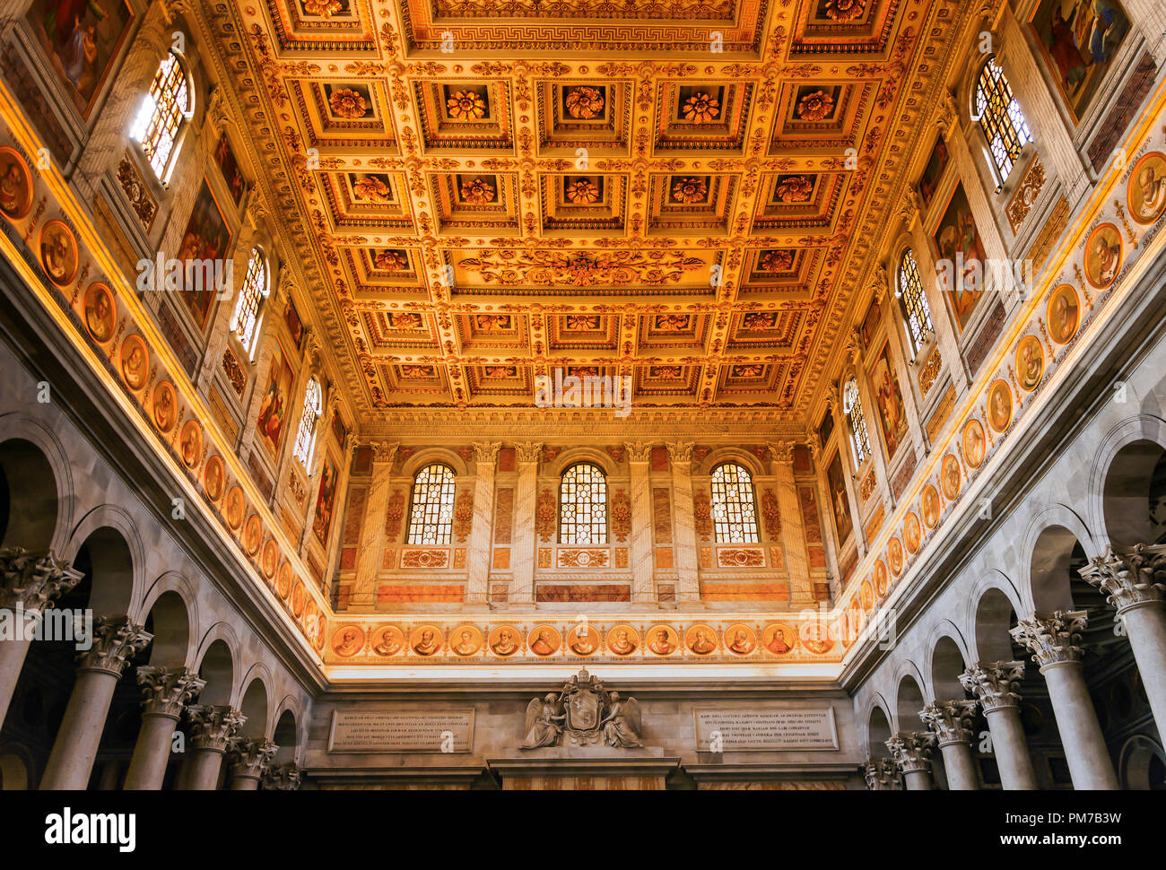 Rome, Italy, April 7th 2017: the ornate ceiling inside the basilica of St Paul outside the walls in Rome Stock Photo