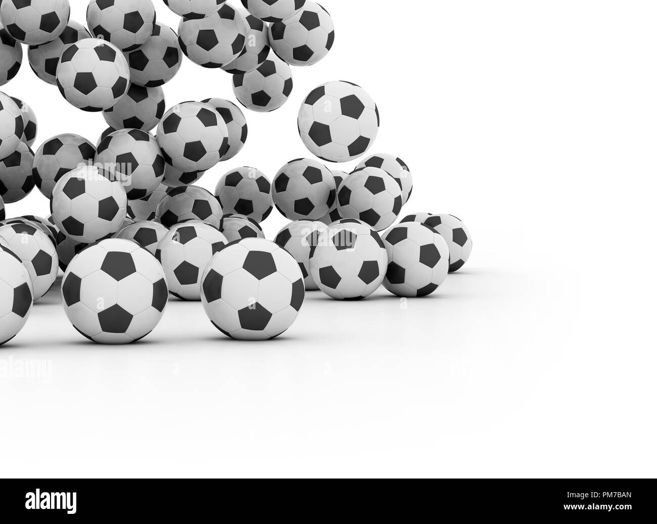 Group of falling soccer balls on white background Stock Photo