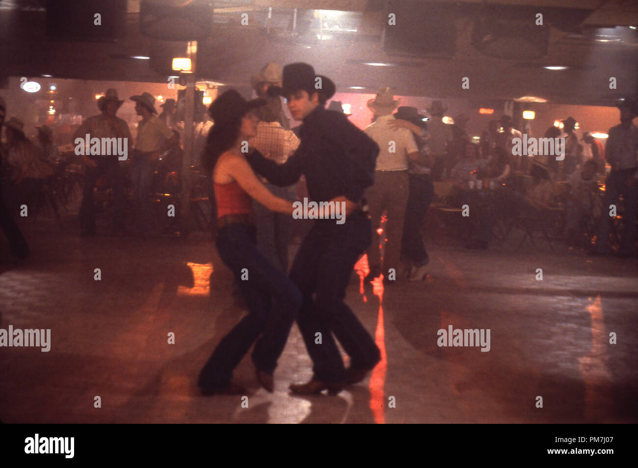 Film Still from 'Urban Cowboy' Debra Winger, John Travolta © 1980 Paramount Pictures Stock Photo