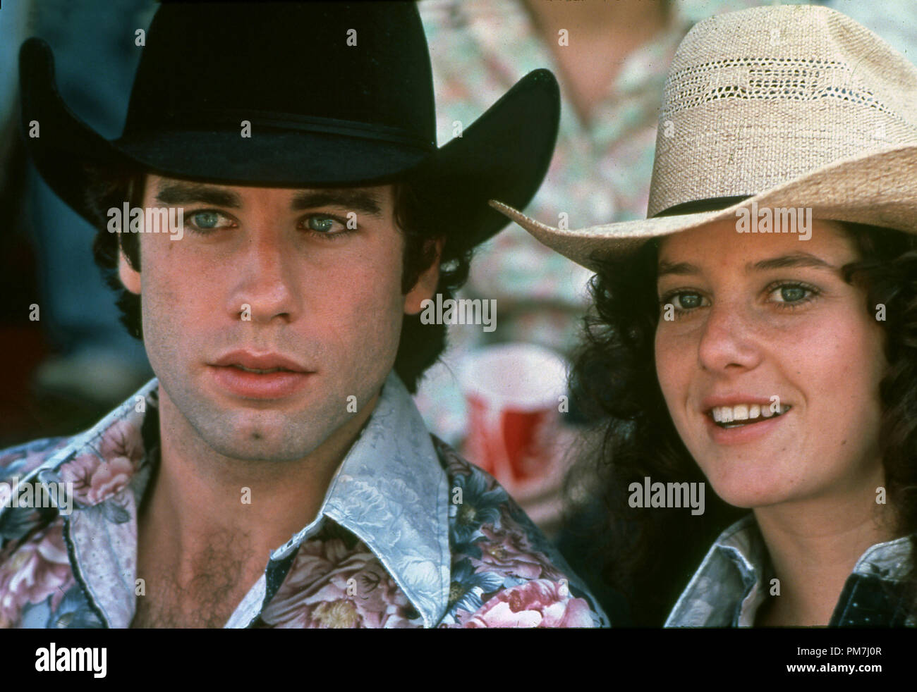 Film Still from 'Urban Cowboy' John Travolta, Debra Winger © 1980 Paramount Pictures Stock Photo