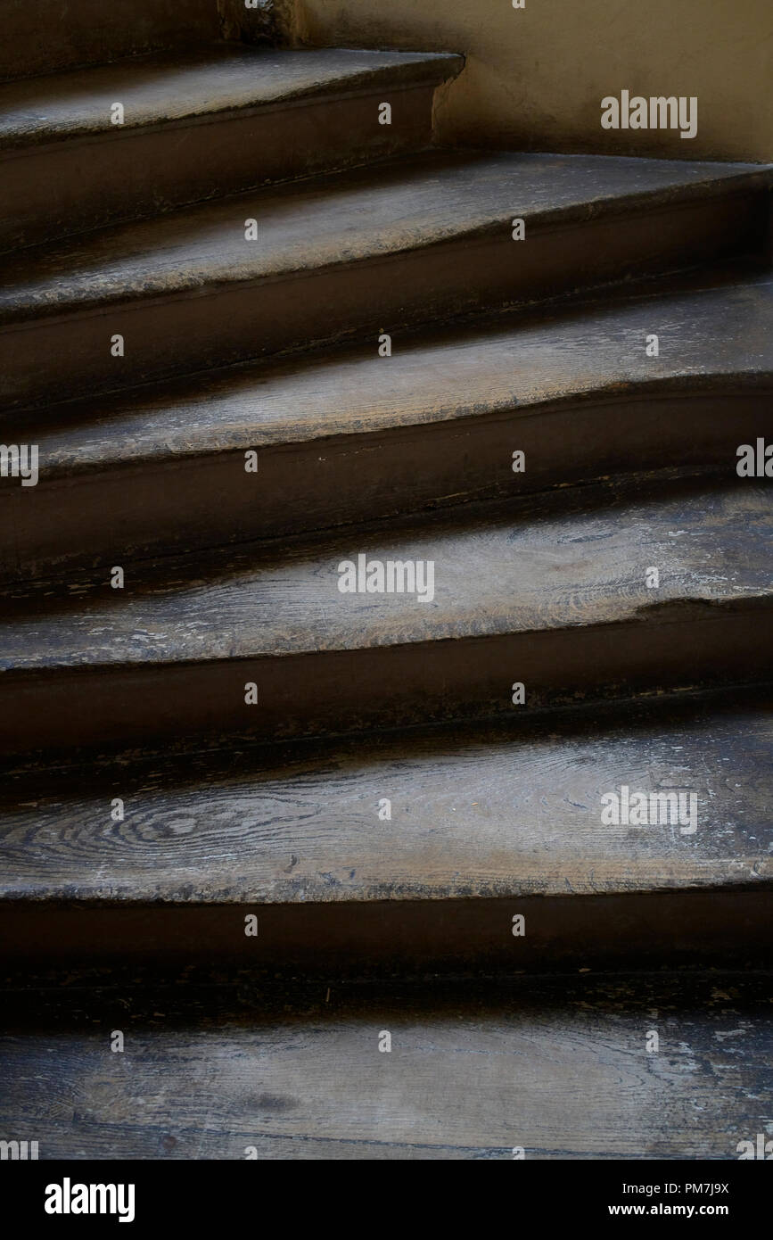 Detail of old worn out wooden stairs. Stock Photo