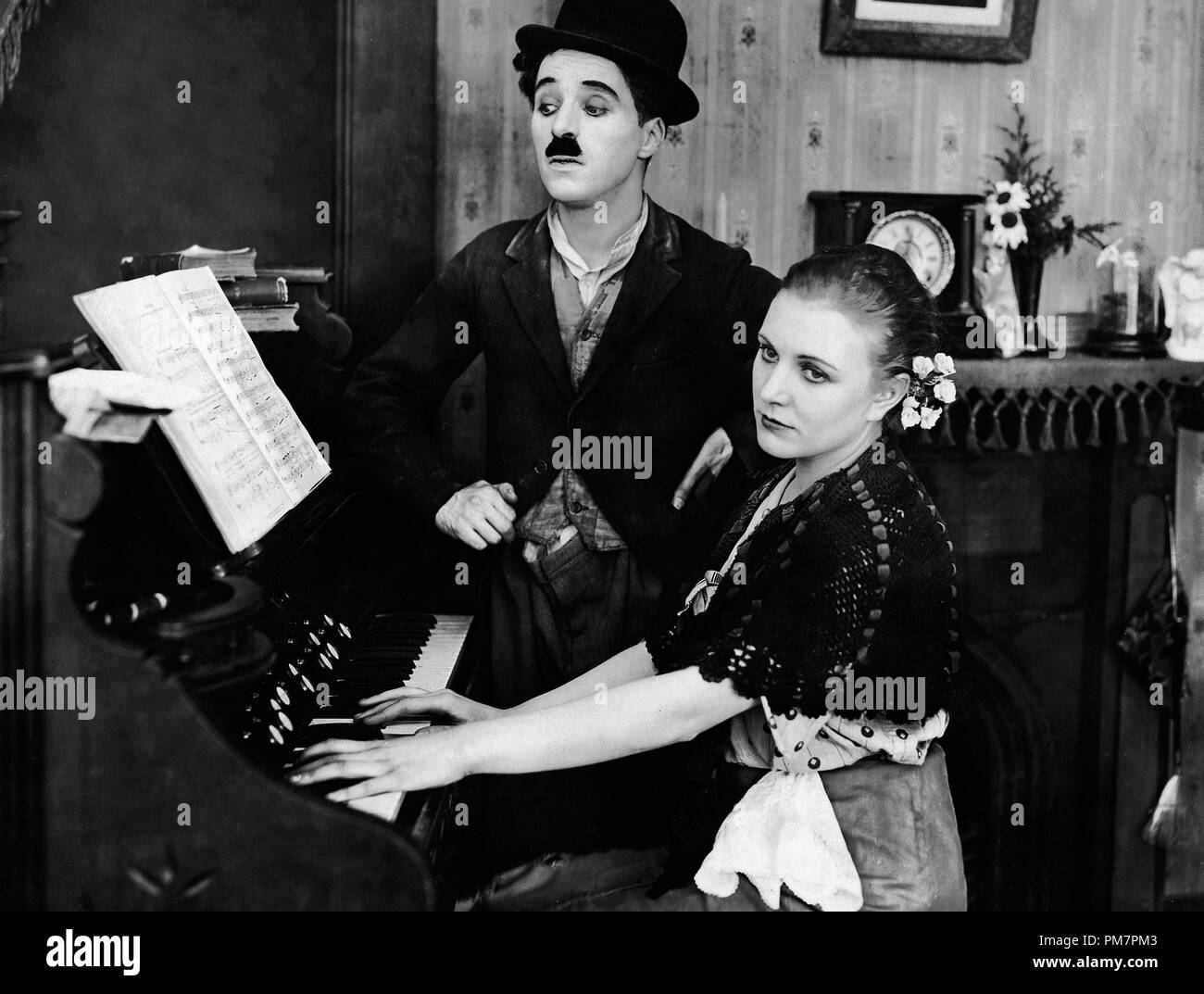 Studio Publicity Still: 'Sunnyside'  Charles Chaplin  1919 First National          File Reference # 31386 1004THA Stock Photo