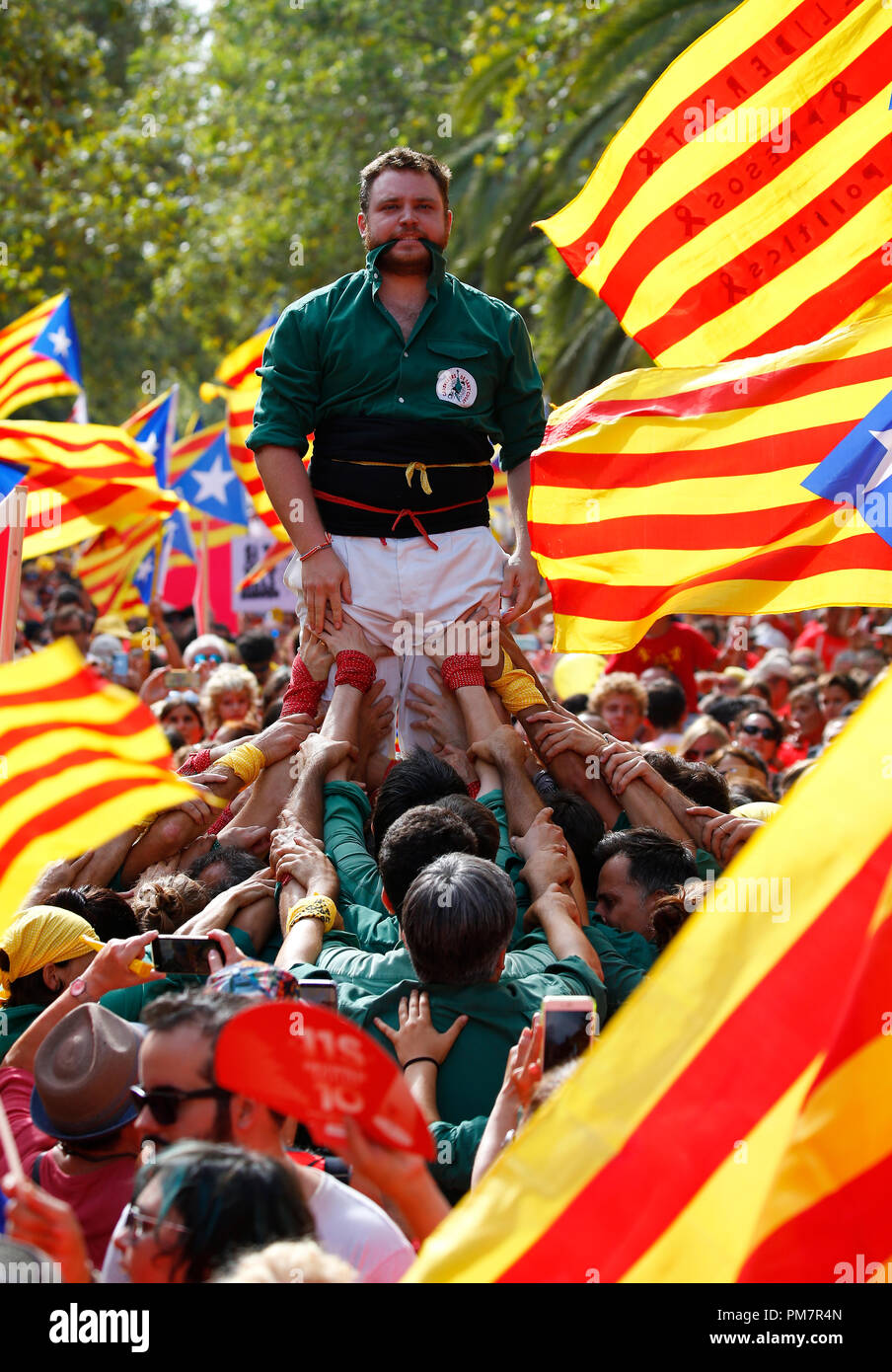 Castellers, traditional Catalan human towers, are built in Barcelona during  their Diada, a yearly Catalan Nationalism celebration day Stock Photo -  Alamy