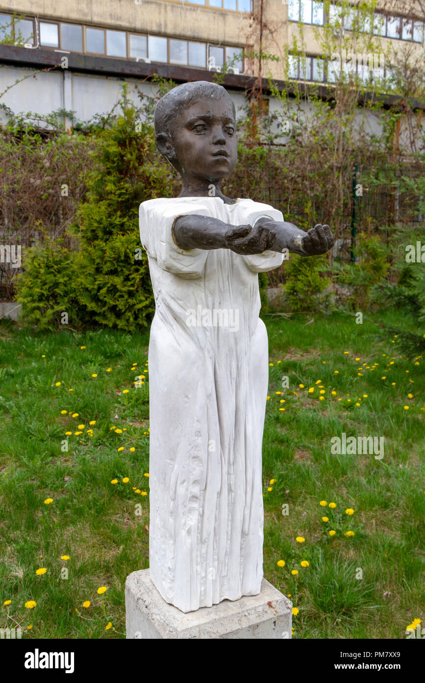 'Earth from the War' by Mincho Minev on display in the Museum of Socialist Art outdoor sculpture garden, Sofia, Bulgaria. Stock Photo