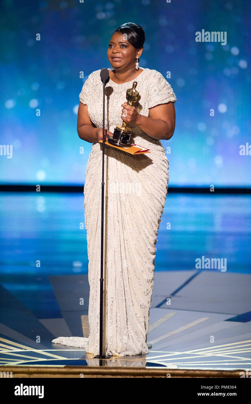 Octavia Spencer accepts the Oscar for Performance by an Actress in a  Supporting Role, for her role in \, image size:866x1390