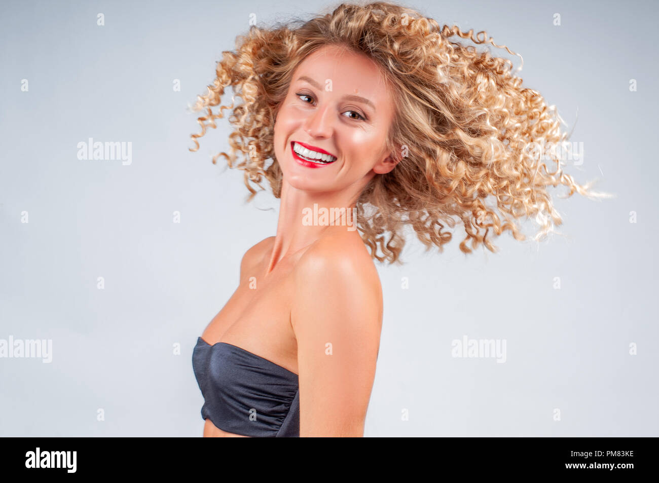 Happy Girl With Healthy Curly Hair Beautiful Woman With Wavy