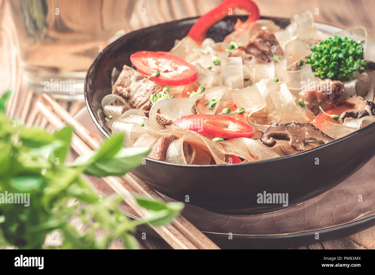 Hot asian spicy dish thick cut glass noodles mung fungosa beans in