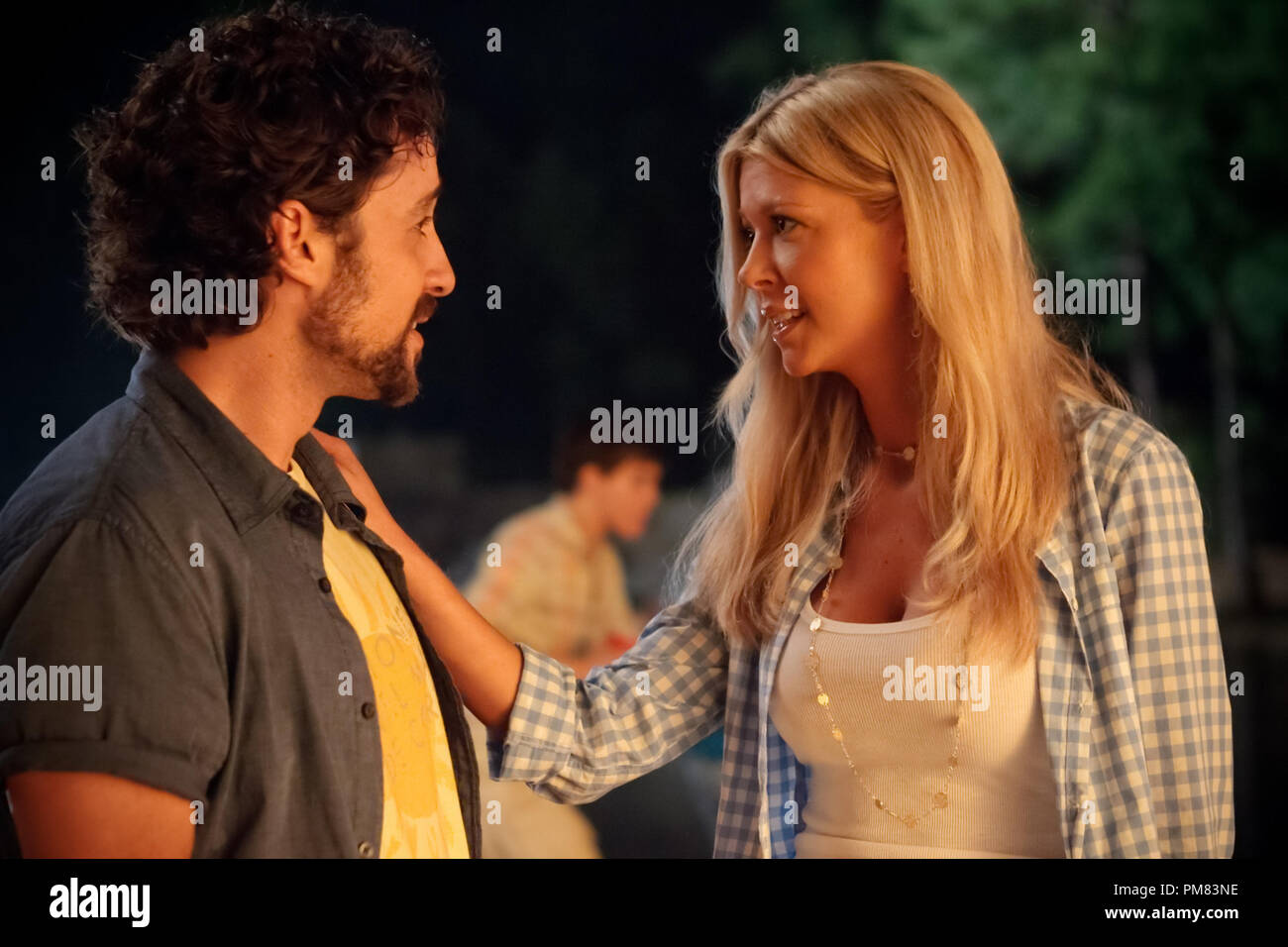 Kevin (THOMAS IAN NICHOLAS) reconnects with first love Vicky (TARA REID) in American Reunion.  In the comedy, all the American Pie characters we met a little more than a decade ago return to East Great Falls for their high-school reunion. Stock Photo