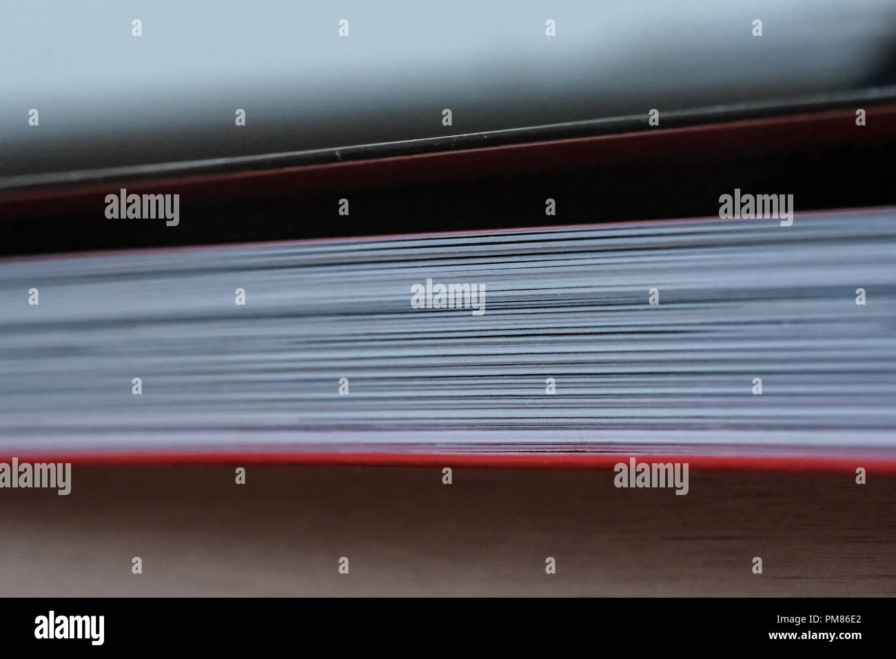 macro image of paper book pages up close. abstract image with bookmark